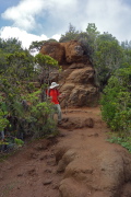 David passes a outcropping of crumbly volcanic rock.