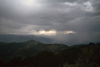 The Sierras are visible through the virga.