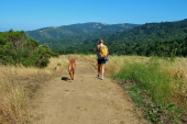 Kumba and Laura walk down the trail.
