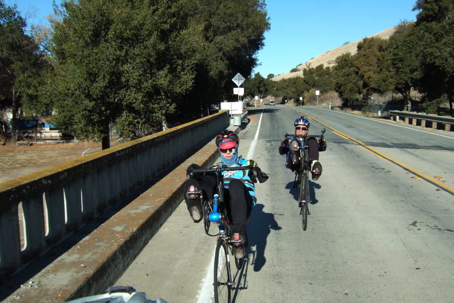 Jim Kern (l) and Tim Woudenberg southbound on CA25 cross the San Benito River near Bolado Park.