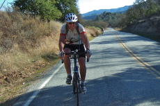 Jon Kaplan climbs the third hill on Cienega Road.