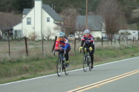 Cyclists ride across Bear Valley. (4a)