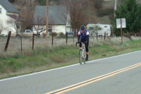 Cyclists ride across Bear Valley. (4b)