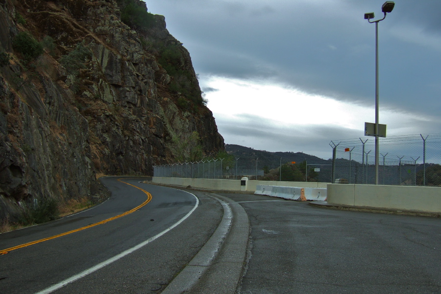 CA128 cuts into the walls of Devils Gate Canyon near Monticello Dam.