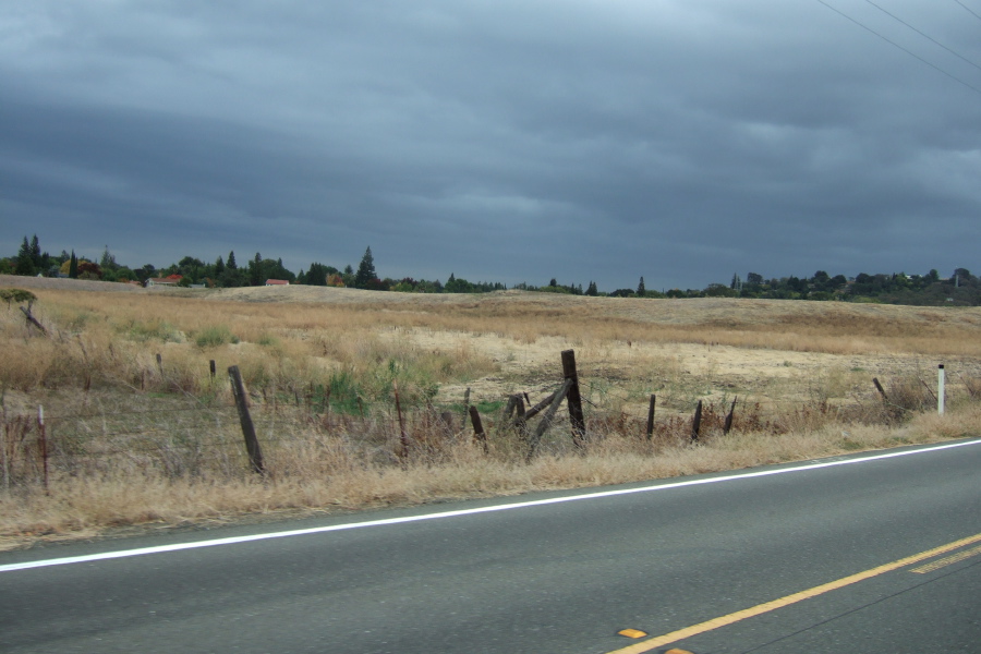 Arriving at the outskirts of Vacaville, under a darkening sky