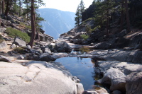 Dry Yosemite Creek before water plunges over the precipice.