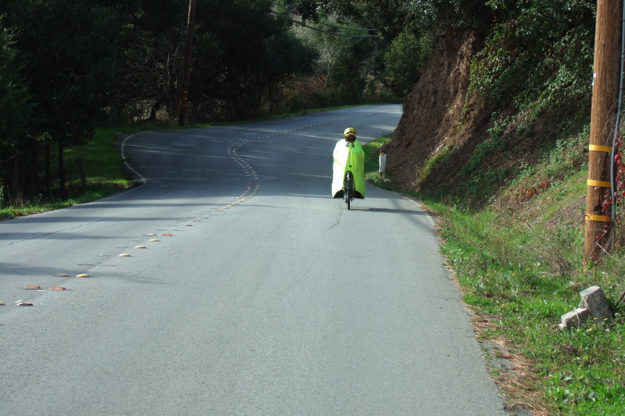 Riding west on Pescadero Road (rear view)