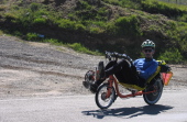 Zach Kaplan riding over Patterson Pass.